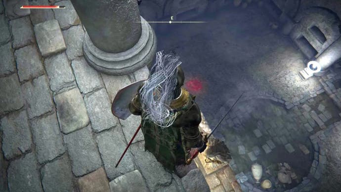 elden ring player on ledge looking down in stormfoot catacombs