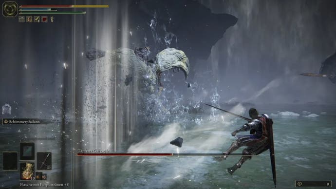 elden ring player being knocked to the side by the valiant gargoyle boss.