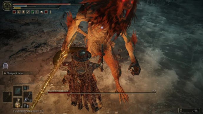elden ring player stabbing the misbegotten crusader in the cave of the forlorn
