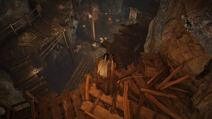 elden ring player standing on ledge of wood in old altus tunnel