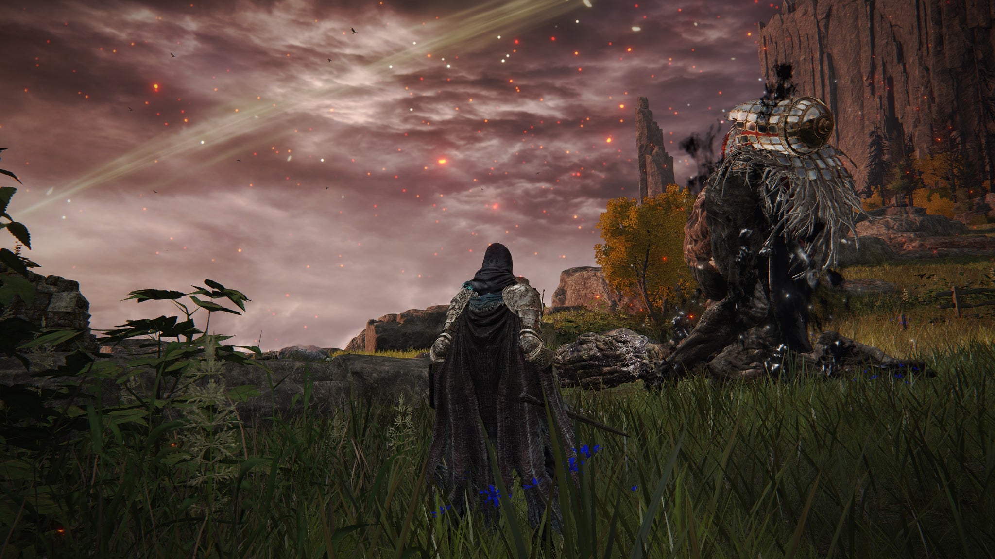 The player in Elden Ring finds Iji's corpse in the middle of the road, engulfed by black flame. - 18