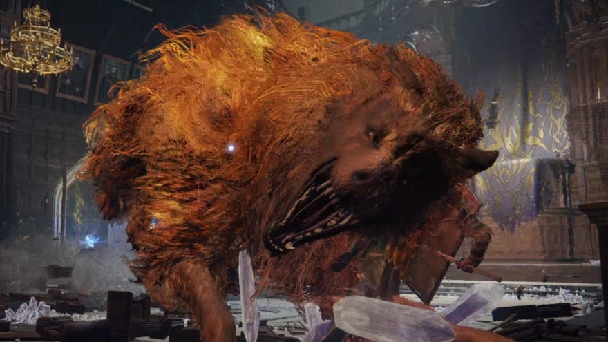 The Red Wolf of Radagon, a boss in Elden Ring, biting towards the player.