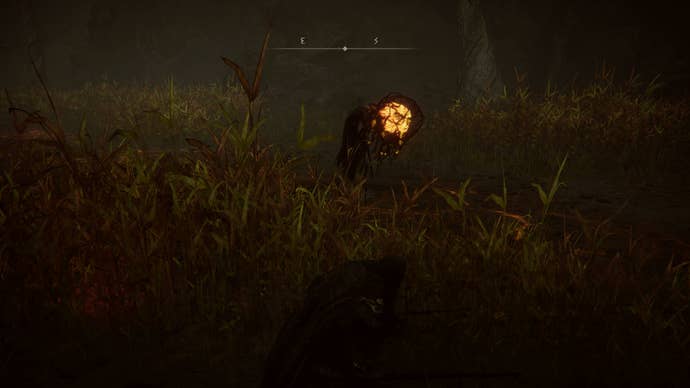 The Tarnished sneaking past a Wormface in the Abyssal Woods in Elden Ring Shadow of the Erdtree.