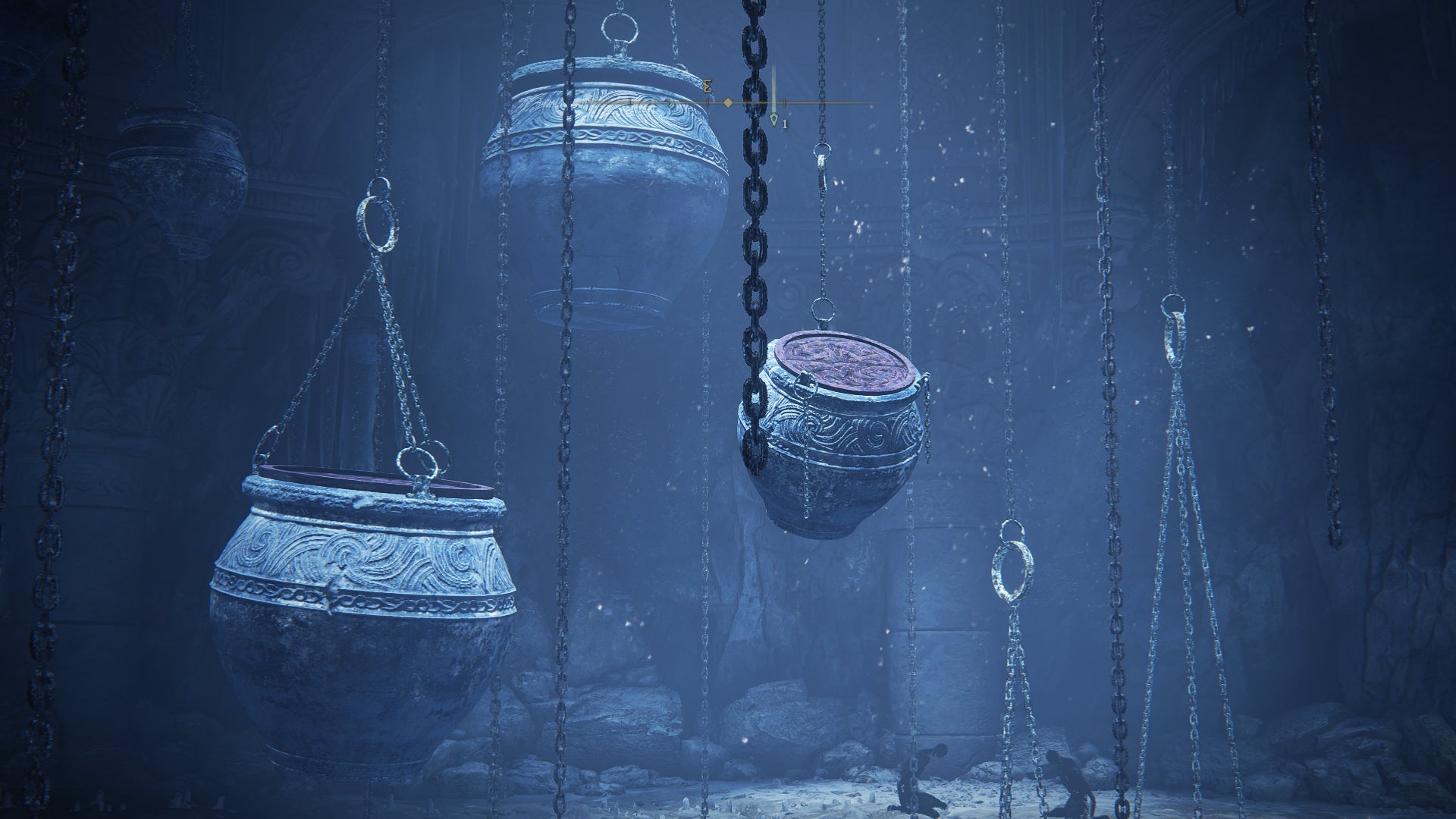 Elden Ring: Shadow Of The Erdtree screenshot of large jars chained to a dungeon ceiling.