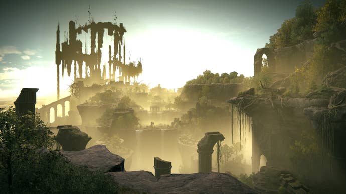 An establishing shot of the Ancient Ruins Of Rauh region in Elden Ring: Shadow Of The Erdtree, with Enir-Ilim visible in the distance.