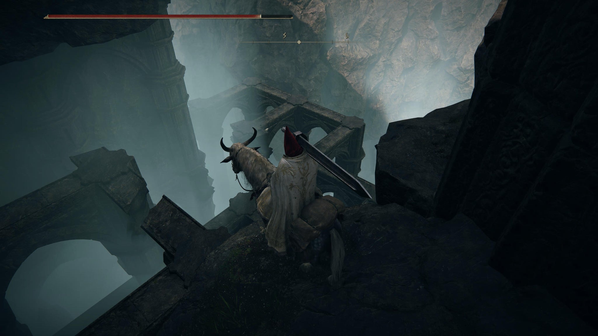 The Tarnished dropping down to a hidden area in the Ancient Ruins of Rauh in Elden Ring Shadow of the Erdtree. - 19