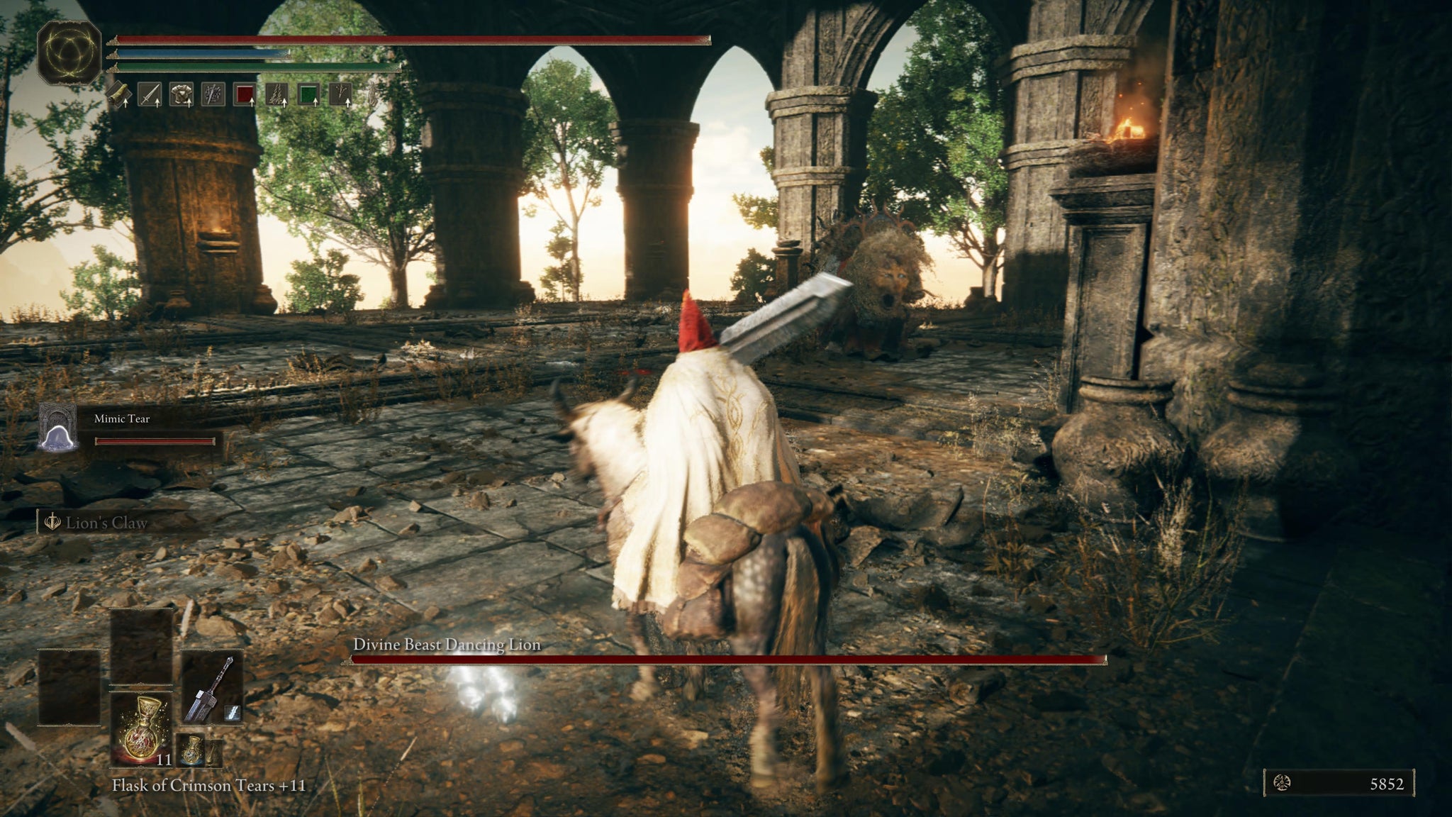 The Tarnished starting a rematch with the Divine Beast: Dancing Lion in the Ancient Ruins of Rauh in Elden Ring Shadow of the Erdtree. - 21