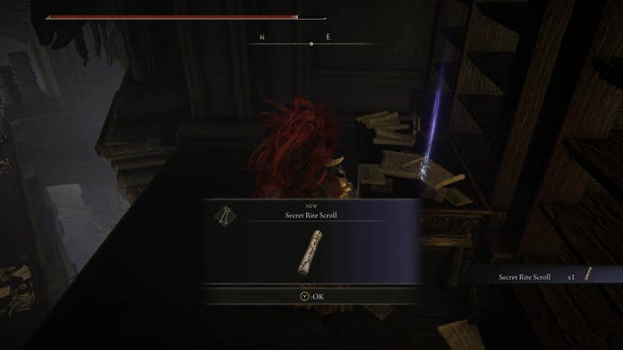 A warrior picks up the Secret Rite Scroll in Elden Ring Shadow of the Erdtree.