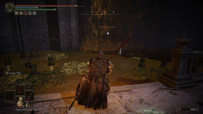The Tarnished targeting a large shadow warrior hiding behind a waterfall in Belurat in Elden Ring Shadow of the Erdtree.