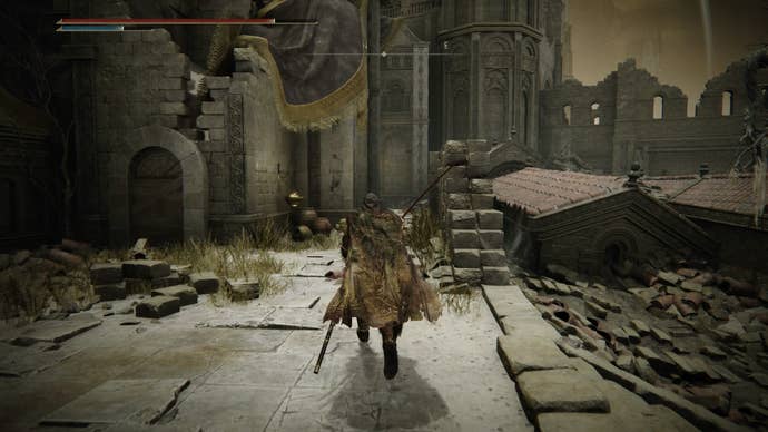 The Tarnished running down a narrow path in Belurat in Elden Ring Shadow of the Erdtree.