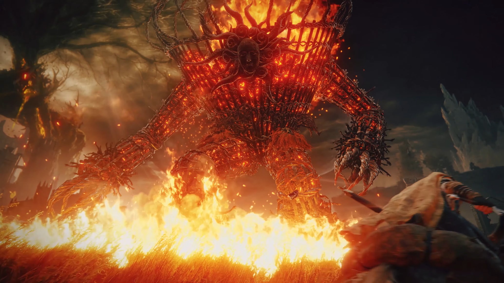 A giant fire brazier boss in the Shadow Of The Erdtree trailer. - 1