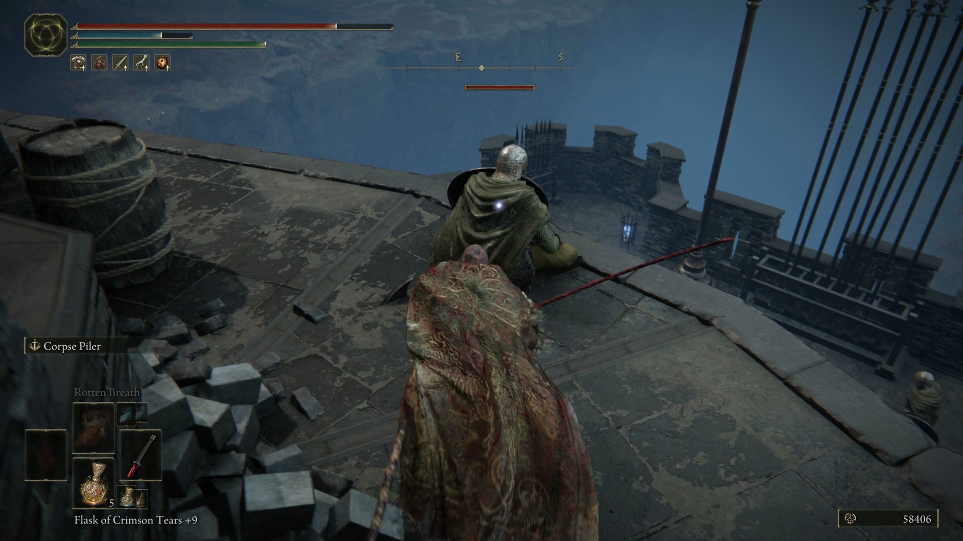 The Tarnished sneaking up on a Messmer Knight on the battlements of Castle Ensis in Elden Ring Shadow of the Erdtree. - 13