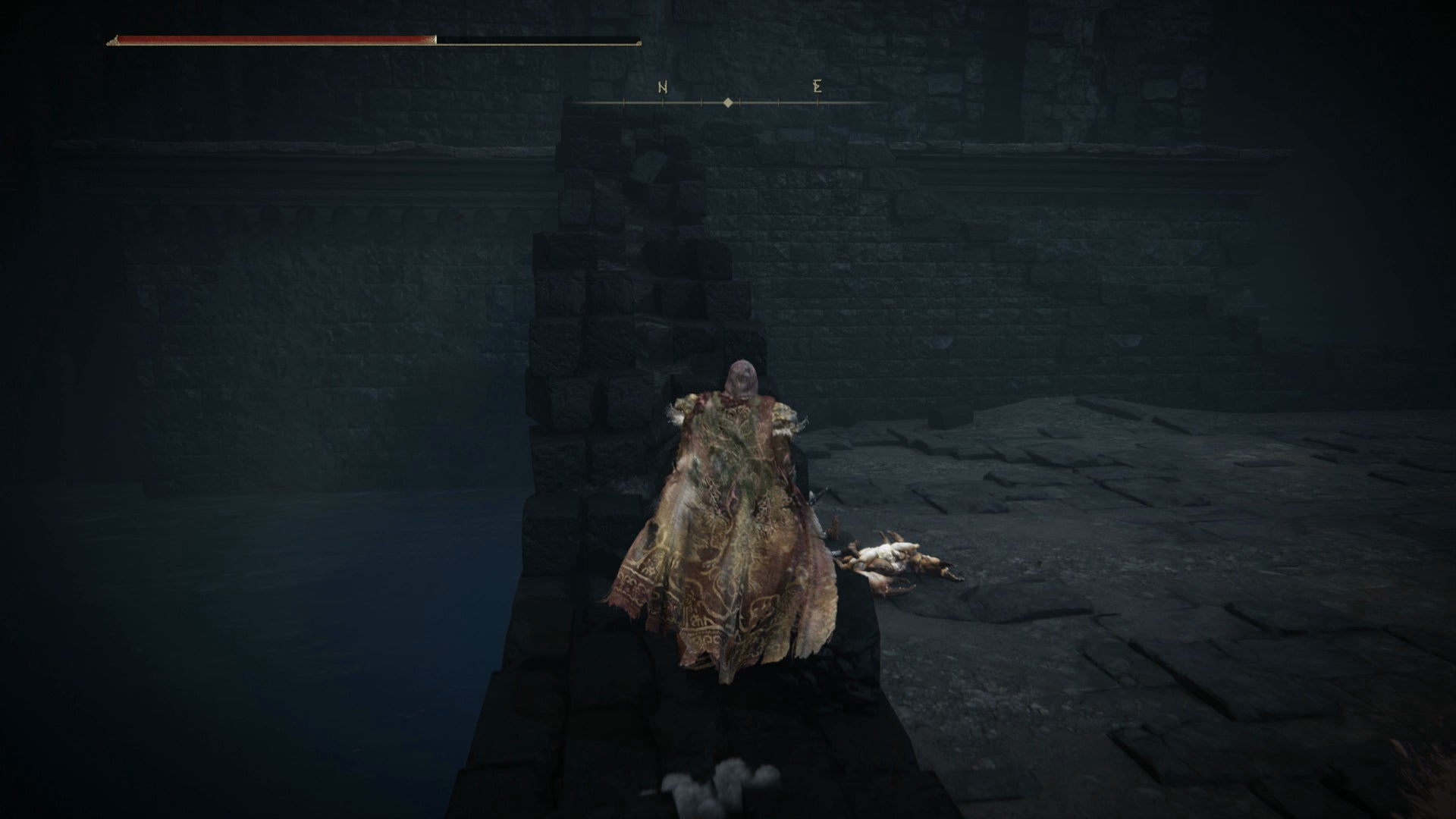 The Tarnished climbing a crumbling wall to reach a higher level in the Black Keep Church District in Elden Ring Shadow of the Erdtree. - 5