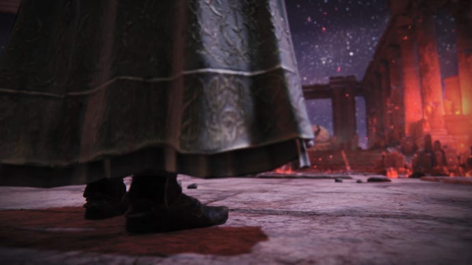A figure in a cloak steps into Mohg's arena in the Shadow Of The Erdtree trailer.