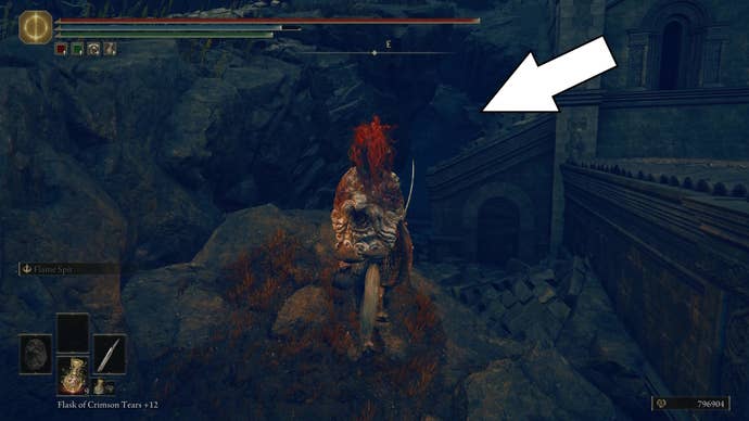 A warrior enters a hidden entrance underground in Elden Ring Shadow of the Erdtree.