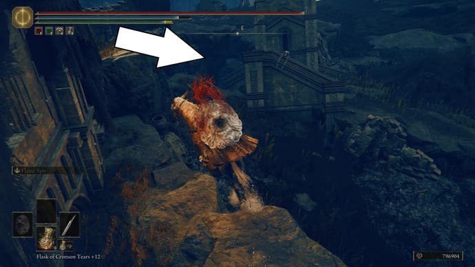 A warrior rides their horse toward a gap in the environment near a church in Elden Ring Shadow of the Erdtree.