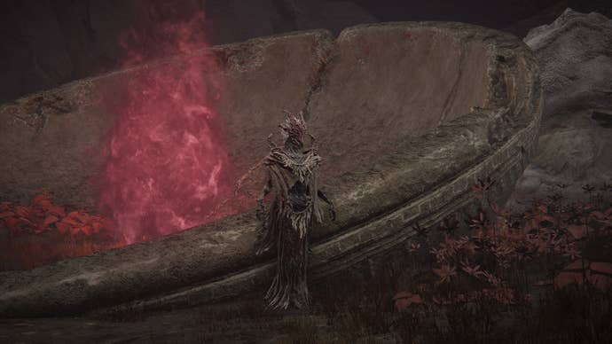 Elden Ring: Shadow Of The Erdtree screenshot of the Dragon Communion Priestess NPC standing in front of the Grand Altar of Dragon Communion.