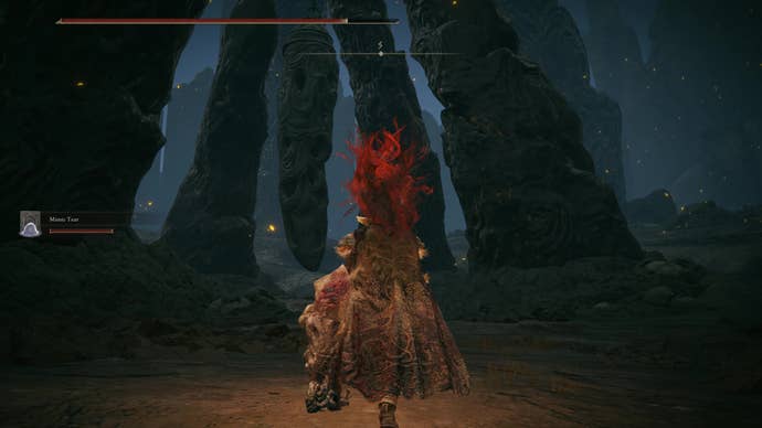 A warrior approaches a hanging bell in the Finger Ruins of Dheo in Elden Ring Shadow of the Erdtree.