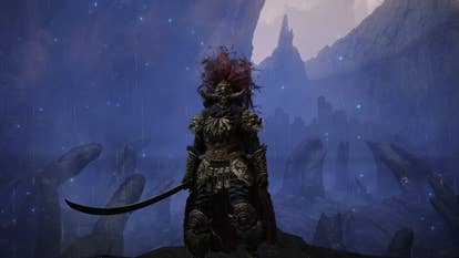 A warrior stands in front of the Finger Ruins of Rhia in Elden Ring Shadow of the Erdtree