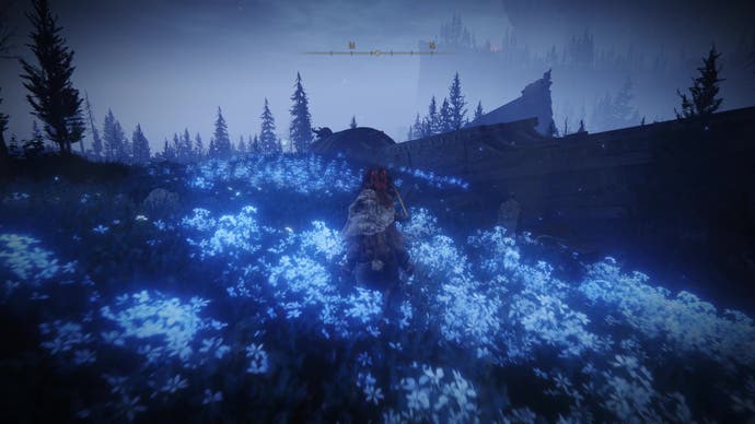 A warrior heads towards a large stone coffin ship in a field of blue flowers in the Cerulean Coast area of Elden Ring Shadow of the Erdtree on the way to the Finger Ruins of Rhia.