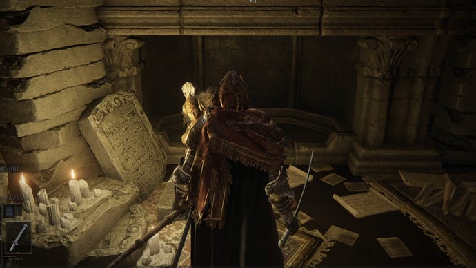 Elden Ring: Shadow Of The Erdtree screenshot of Redmane Freyja crouched next to a tablet within the Specimen Storehouse, in the Shadow Keep.