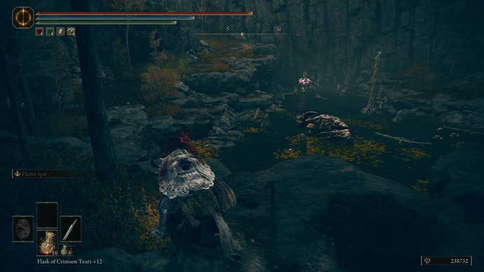 A warrior approaches a giant crab and poisonous plant monster near a cave on the way to the Cerulean Coast in Elden Ring Shadow of the Erdtree.