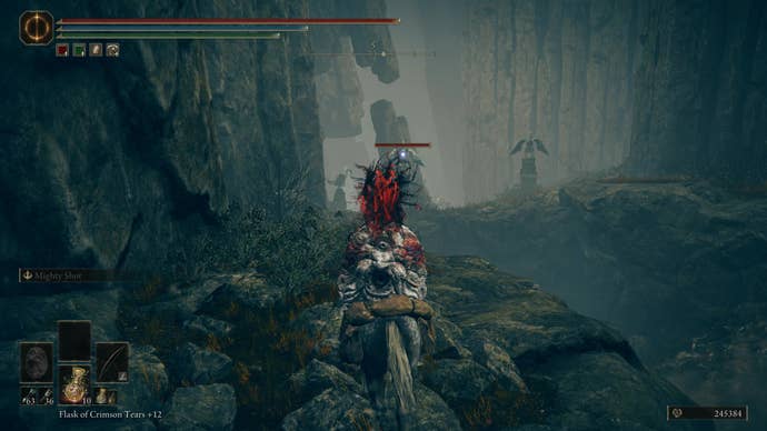 A warrior traverses a narrow causeway on the way to the Cerulean Coast in Elden Ring Shadow of the Erdtree.