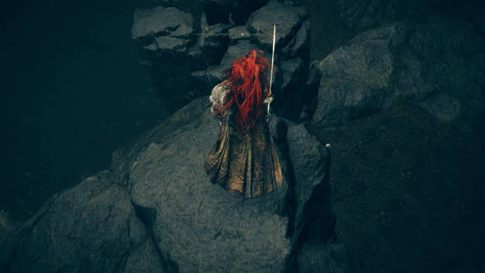 A warrior drops down some rocks on the way to the Cerulean Coast in Elden Ring Shadow of the Erdtree.