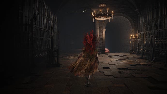 A warrior runs down a corridor with a set of stairs on the way to find the Iris of Grace in the Shadow Keep of Elden Ring's Shadow of the Erdtree DLC.