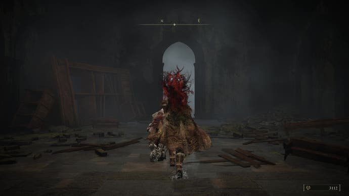 A warrior runs through a corridor on the way to locating an Iris of Occultation in the Shadow Keep in Elden Ring's Shadow of the Erdtree DLC,