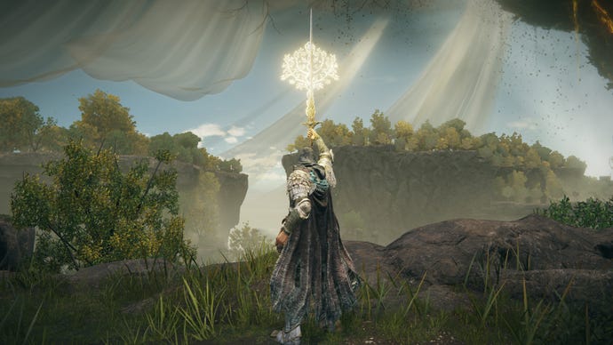 The player in Elden Ring: Shadow Of The Erdtree holds aloft Leda’s Sword and uses its skill while standing in a rocky forest plateau area.