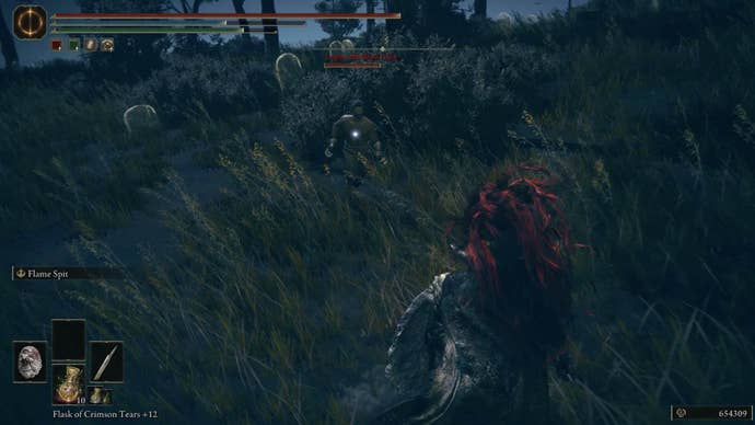 Logur, the Beast Claw approaches a warrior from out of a bush at night in Shadow of the Erdtree.