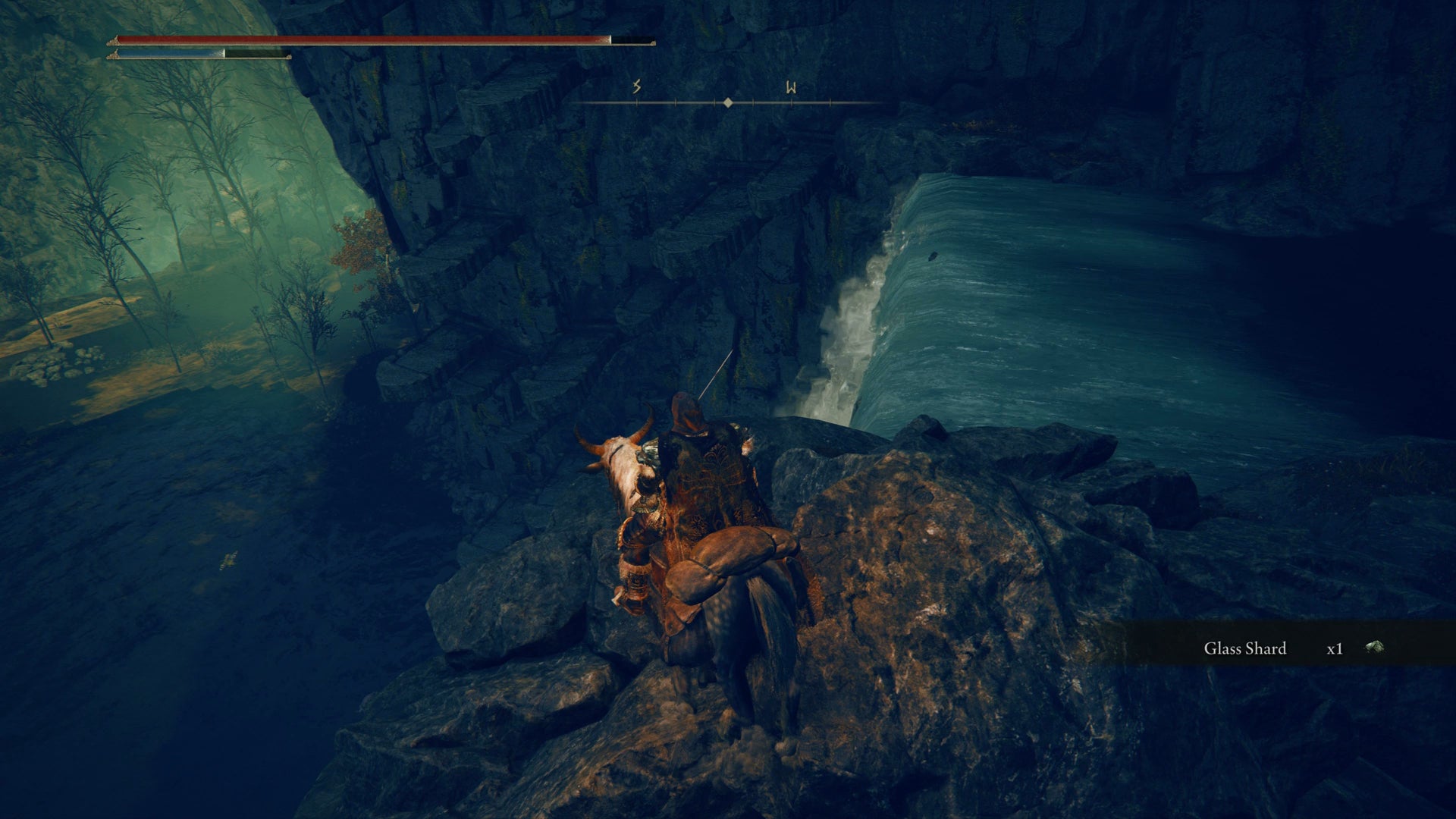 The Tarnished looking over the edge of a waterfall in Elden Ring Shadow of the Erdtree. - 19