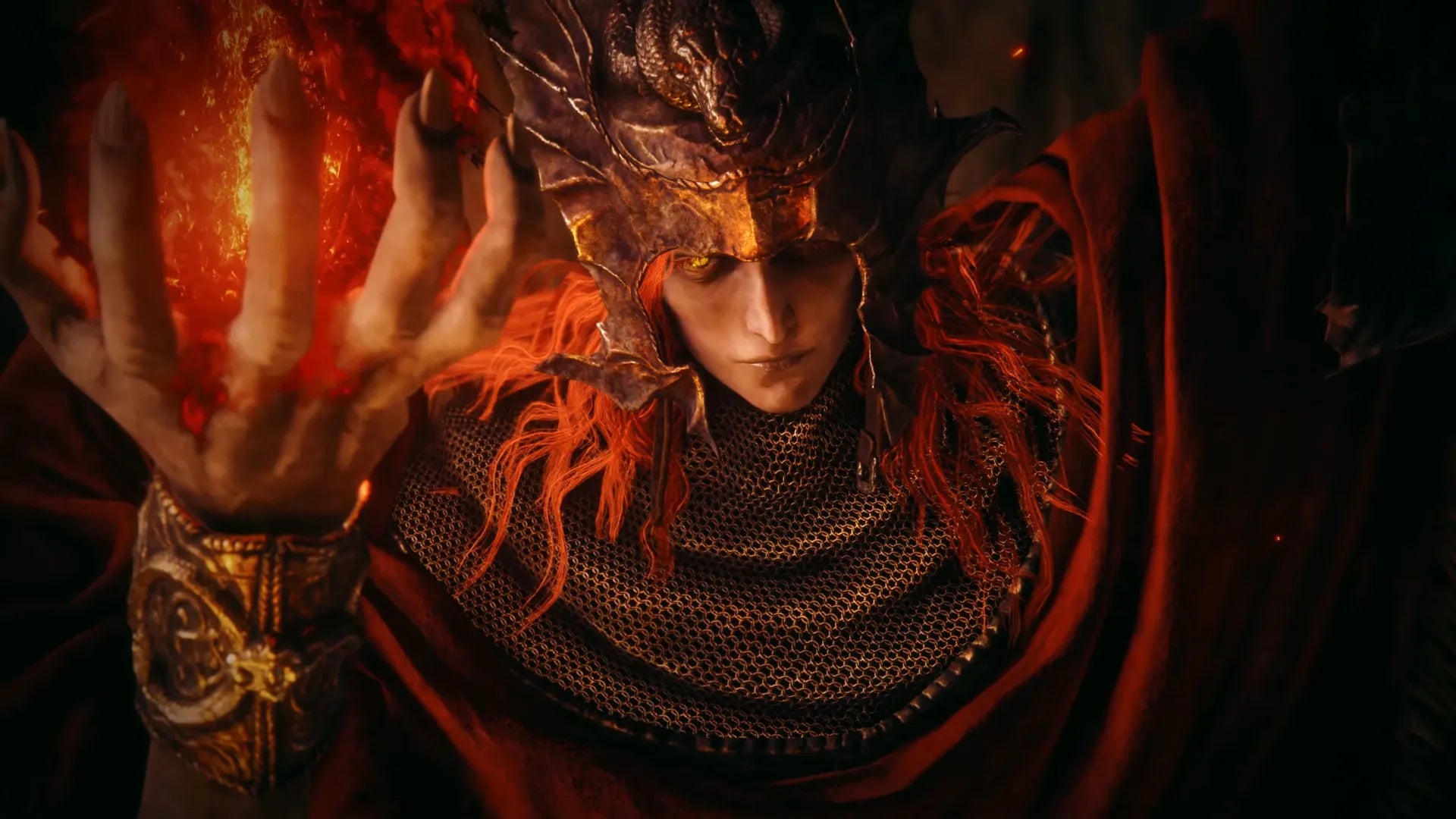 Mesmer the Impaler raises a hand cupping a glowing red item in Elden Ring DLC Shadow of the Erdtree - 4