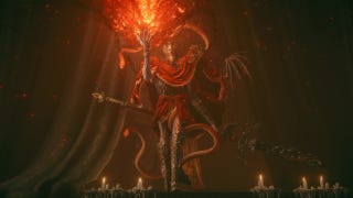 Messmer the Impaler holds a ball of flame aloft while clutching his spear in Elden Ring Shadow of the Erdtree.
