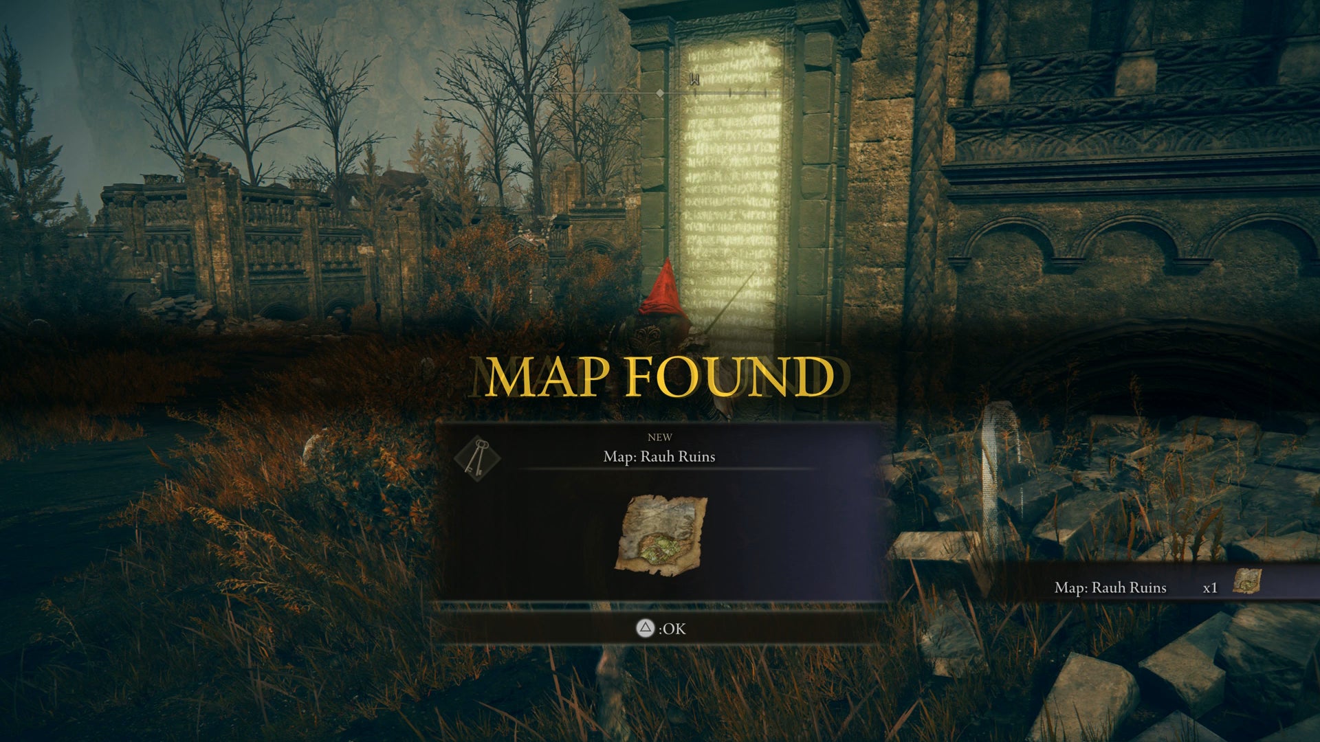 The Tarnished picking up a map of the Ancient Ruins of Rauh in Elden Ring Shadow of the Erdtree. - 6