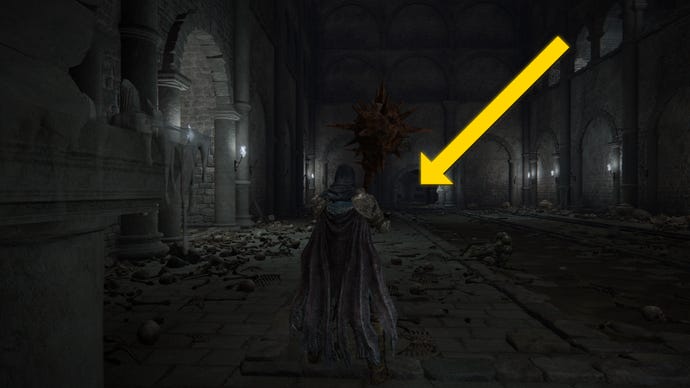 The player in Elden Ring: Shadow Of The Erdtree makes their way through the Fog Rift Catacombs, with a yellow arrow pointing towards the location of the hidden Altar.