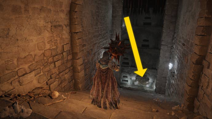 The player in Elden Ring: Shadow Of The Erdtree makes their way through the Fog Rift Catacombs, with a yellow arrow pointing towards the location of the hidden Altar.