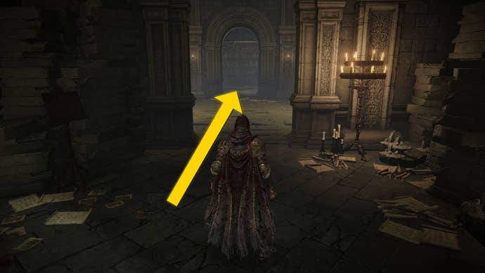 The player in Elden Ring: Shadow Of The Erdtree stands in front of a doorway. At the far end of the corridor is an elevator.