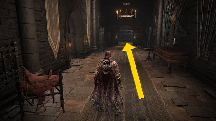 The player in Elden Ring: Shadow Of The Erdtree walks down a corridor inside the Shadow Keep.