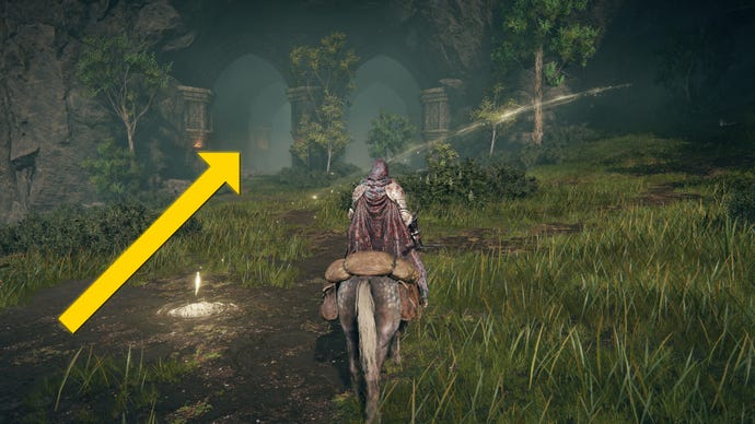 The player in Elden Ring: Shadow Of The Erdtree rides their horse past a Site Of Grace in Rauh Ancient Ruins.