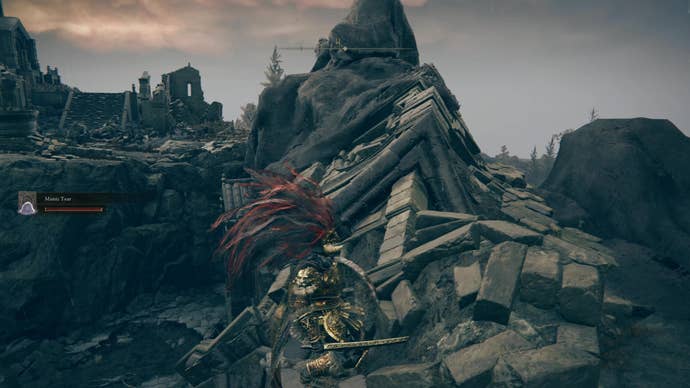 A warrior clambers over rooftops in Prospect Town in Elden Ring Shadow of the Erdtree.