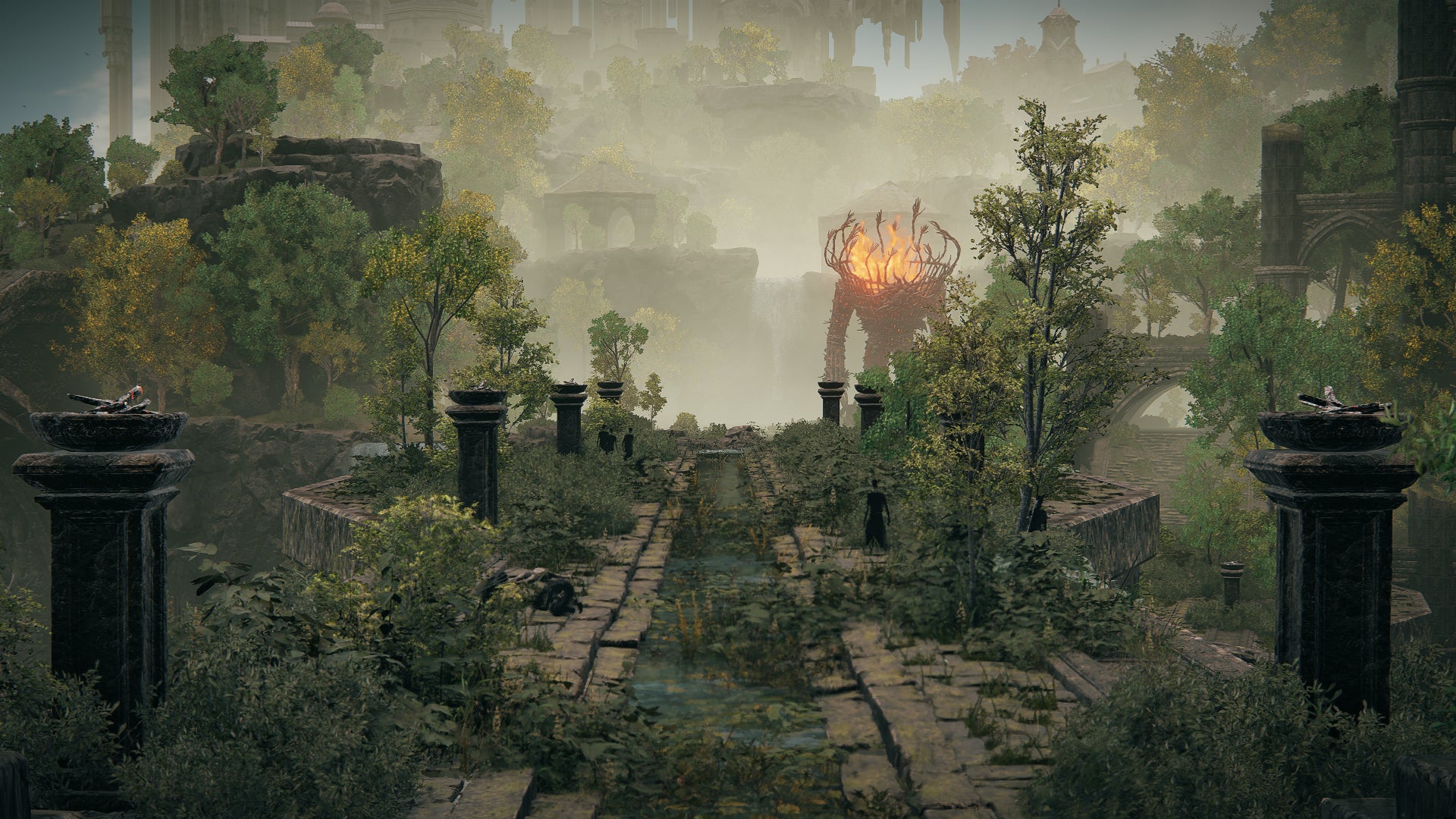 View from across the great bridge in the upper Ancient Ruins of Rauh region of Elden Ring: Shadow Of The Erdtree. - 1