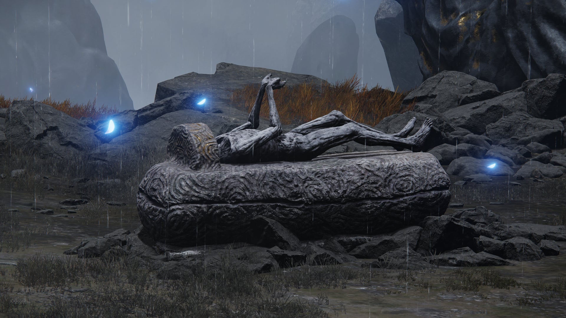 A stone coffin in Elden Ring: Shadow Of The Erdtree, with a statue of a person lying on top. - 4