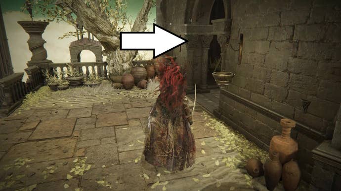 A warrior approaches a small tower room in Enir Ilim to claim a Scadutree Fragment, the entrance to which is highlighted by a white arrow, in Elden Ring Shadow of the Erdtree.