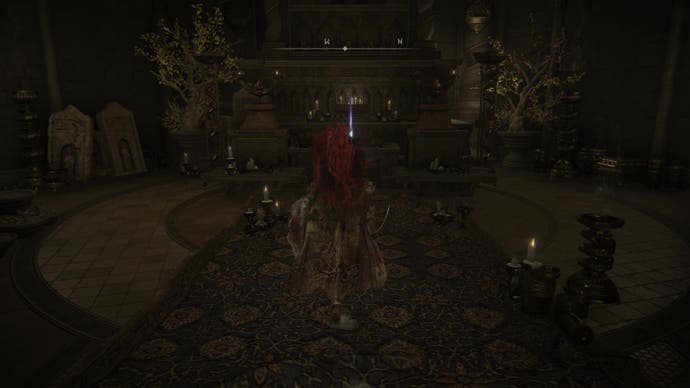 A warrior approaches an altar with a Scadutree Fragment in front of it in Enir Ilim in Elden Ring Shadow of the Erdtree.