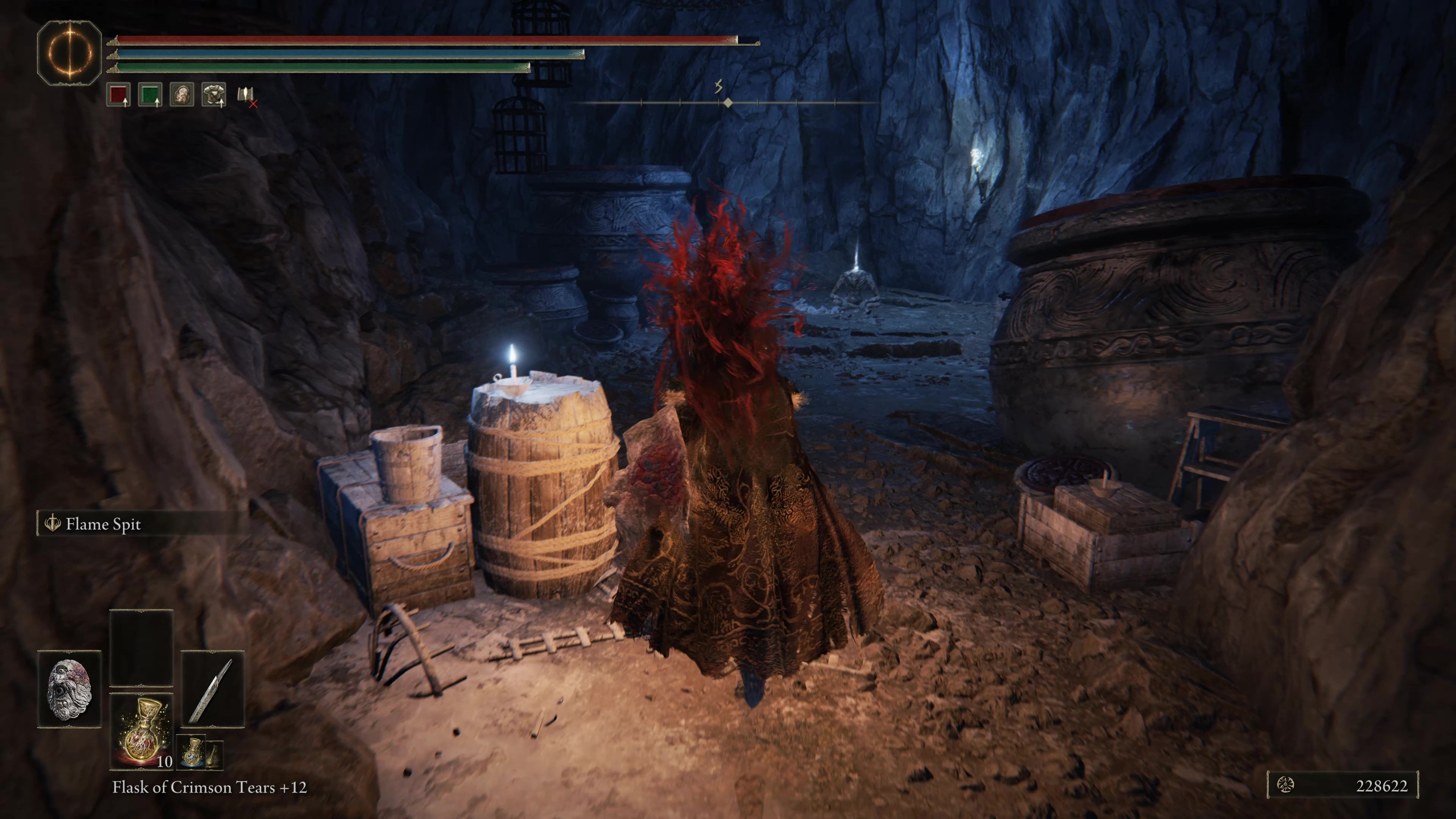 A warrior approaches a glowing corpse in the Belurat Gaol in Shadow of the Erdtree.