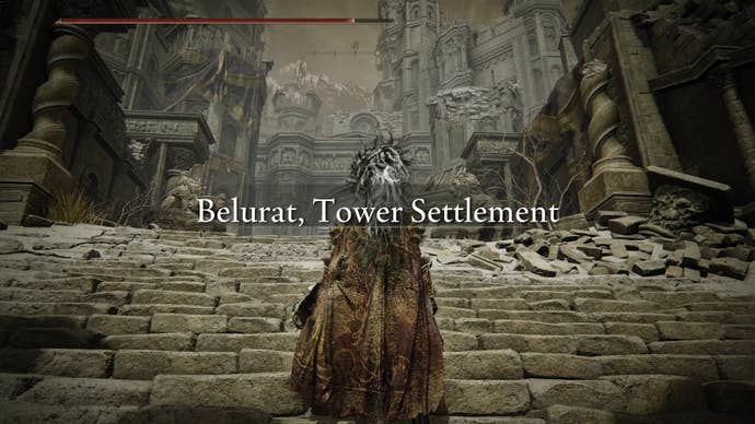 A warrior approaches Belurat, Tower Settlement in Elden Ring’s Shadow of the Erdtree expansion.