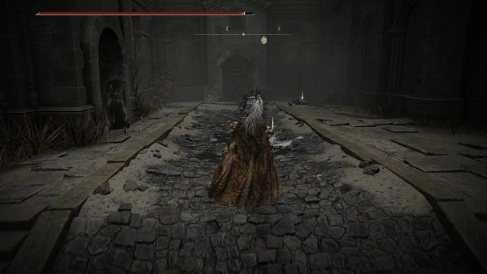 A warrior approaches a dark stairwell in Belurat, Tower Settlement in Shadow of the Erdtree.