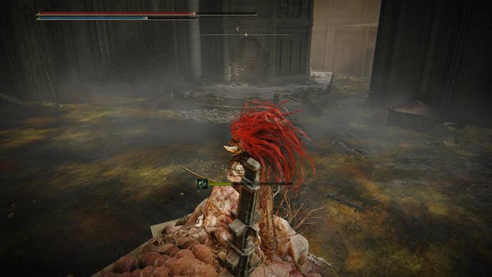 A warrior looks out toward a ladder in Belurat, Tower Settlement in Shadow of the Erdtree